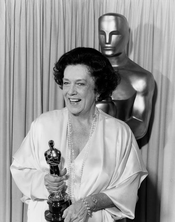 Kay Rose receives Oscar.
