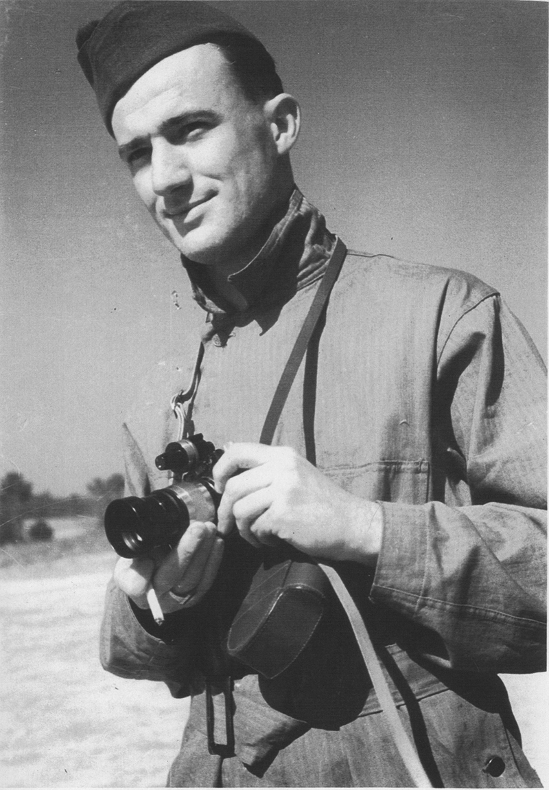 Robert D. Stone with 35mm camera.